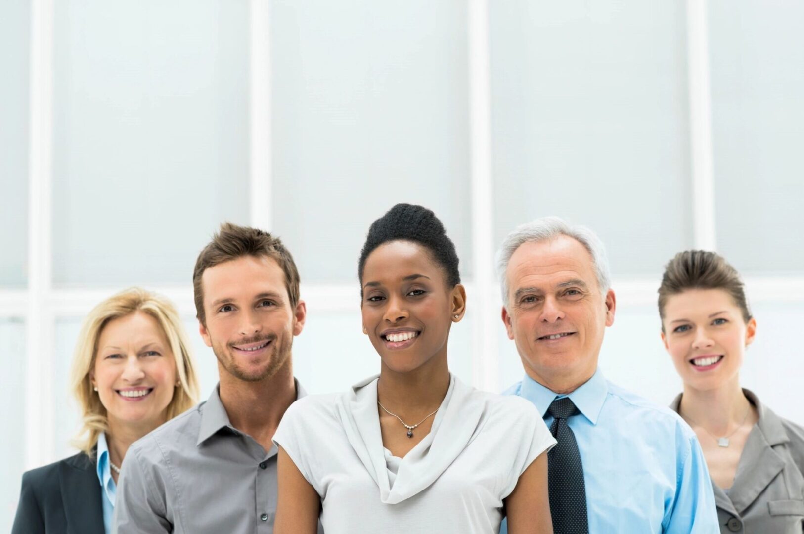 A group of people standing next to each other.